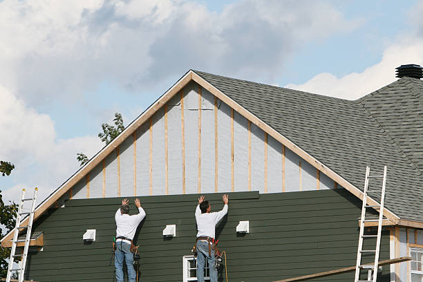 Professional Siding technician working in Immaculata, PA